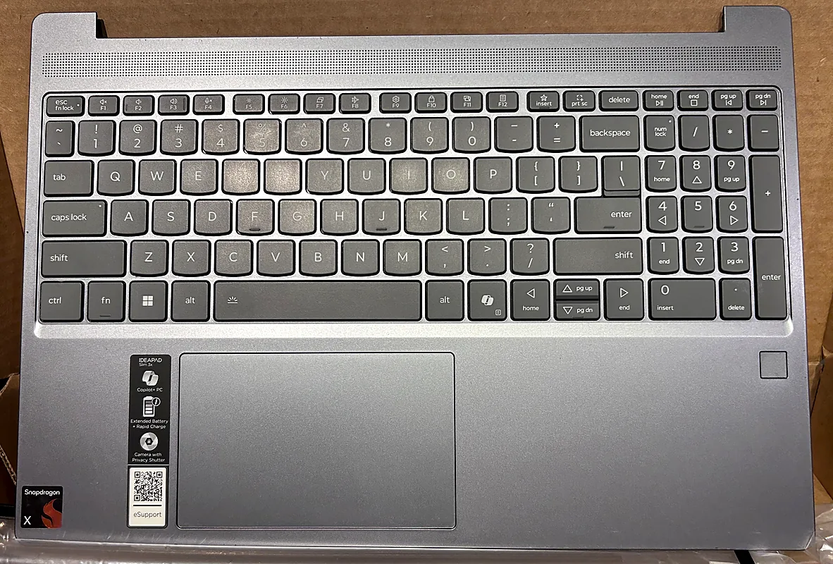 New keyboard and palm rest top case ready to install in a laptop