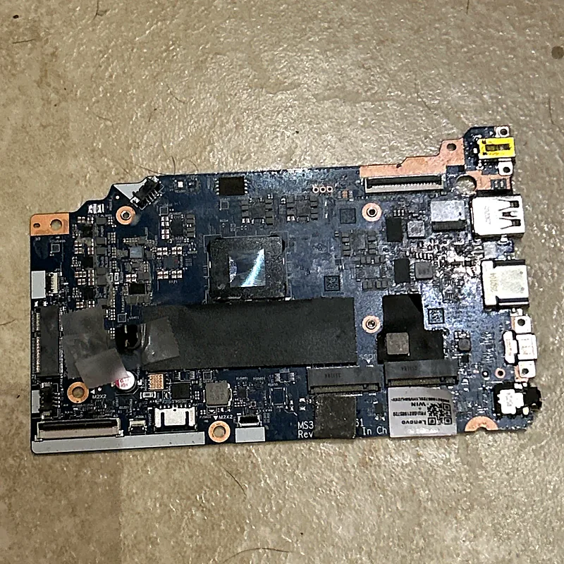 Laptop motherboard taken out of the case for repair